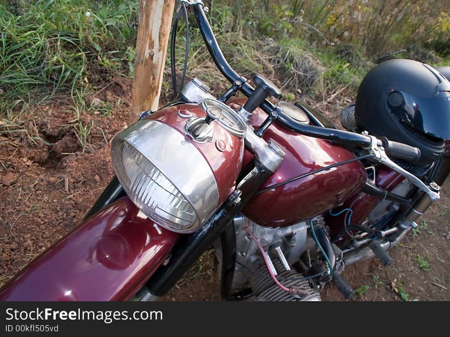 Dark-red russian renewed retro motorcycle