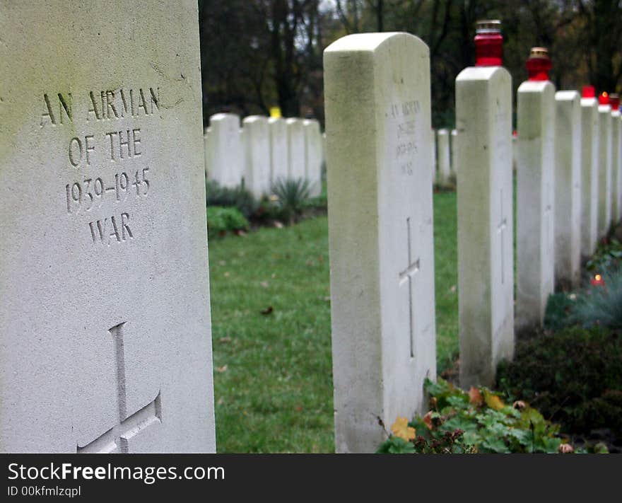 A soldiers grave  in a military graveyard.