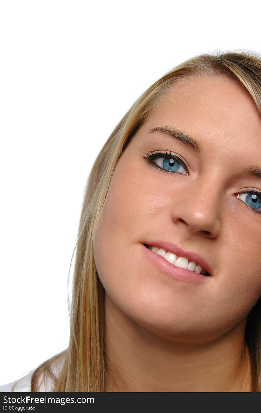 Teen girl close up smiling on a white background