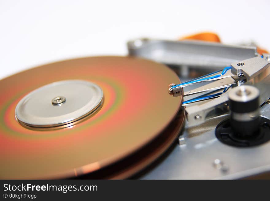 Close-up view of head and disk of HDD. Close-up view of head and disk of HDD