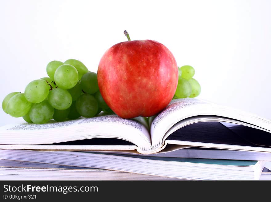 Books and apple