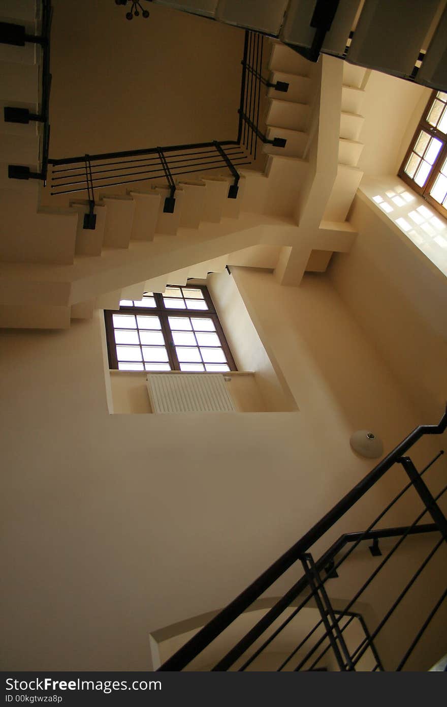 Perspective view at elegance shadowed staircase with windows