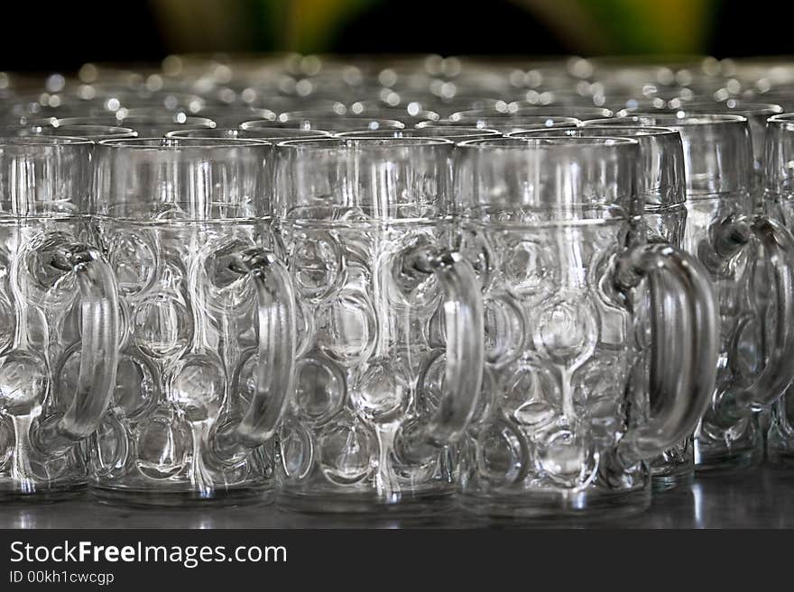 Many empty 1 liter beer mass as used at Munich's Oktoberfest. Many empty 1 liter beer mass as used at Munich's Oktoberfest