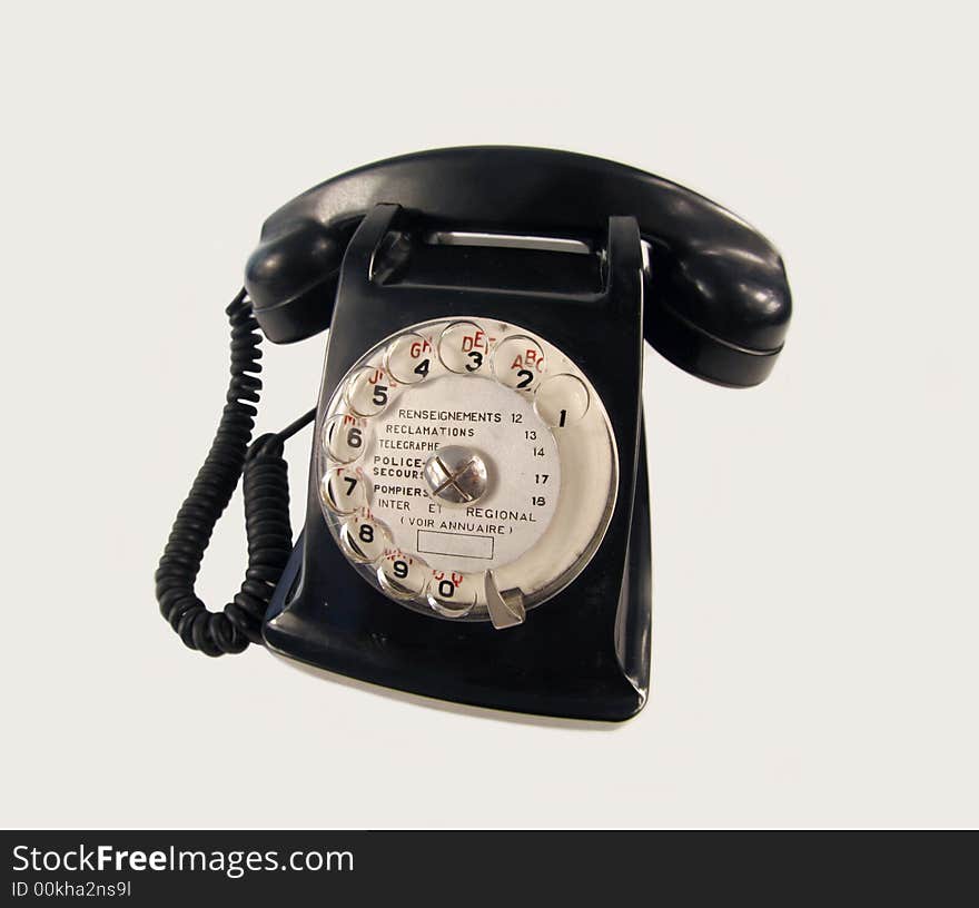 Old black bakelite telephone isolated. Old black bakelite telephone isolated