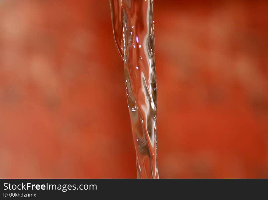 Abstract water flow detail on colored background