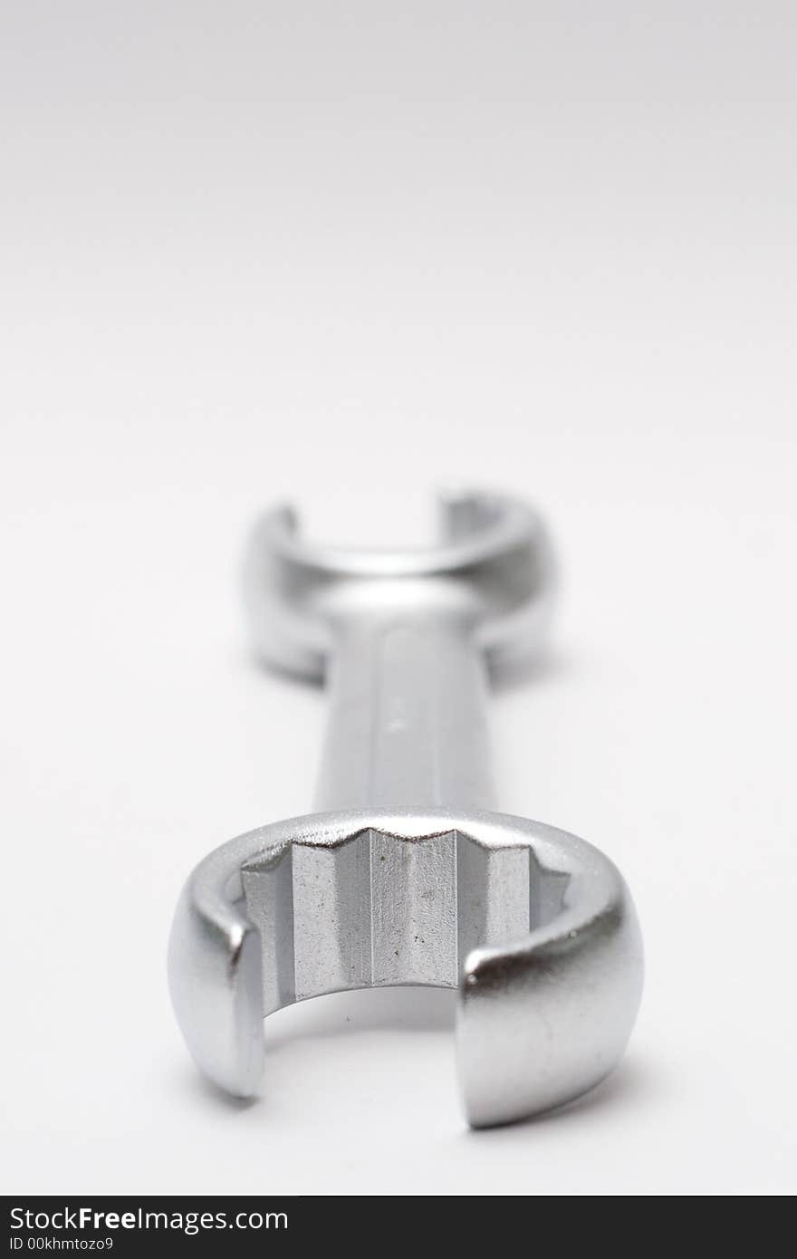 Wrench isolated on semi-white background