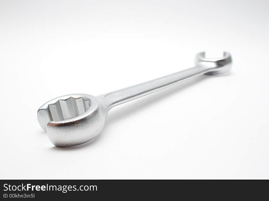 Wrench isolated on semi-white background