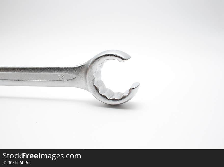 Wrench isolated on semi-white background