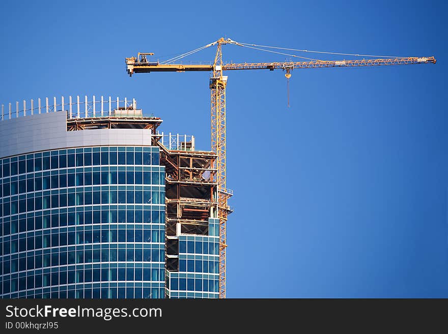 Construction of a skyscraper in Moscow, early morning. Construction of a skyscraper in Moscow, early morning