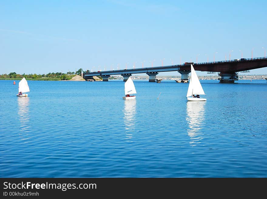 River scenic with bridge and yachts