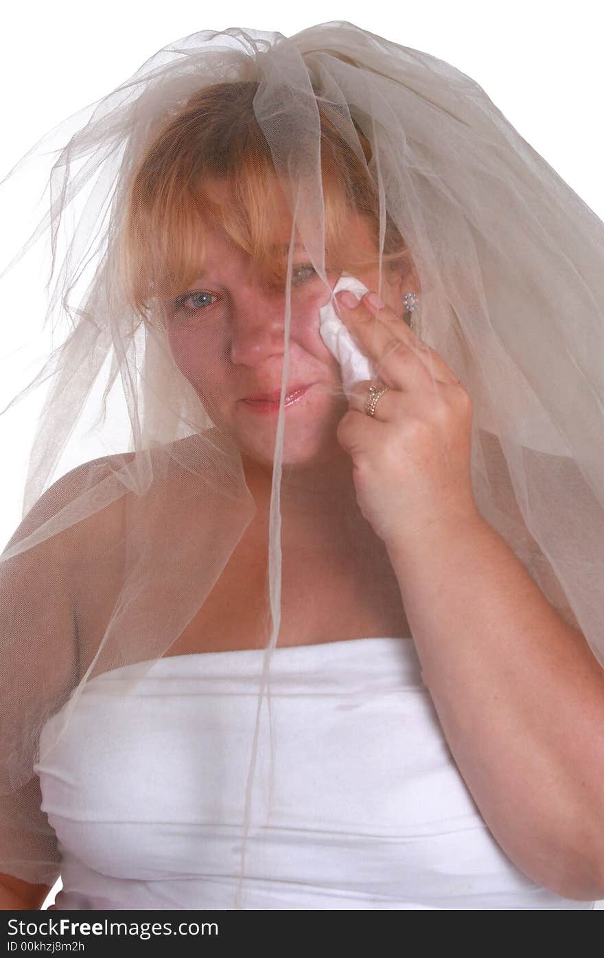 Beautiful blue eyed bride crying in joy. Beautiful blue eyed bride crying in joy.