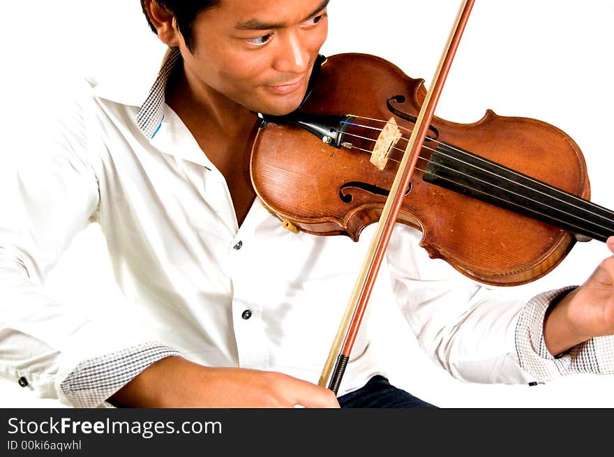 Handsome man is playing the violin. Handsome man is playing the violin