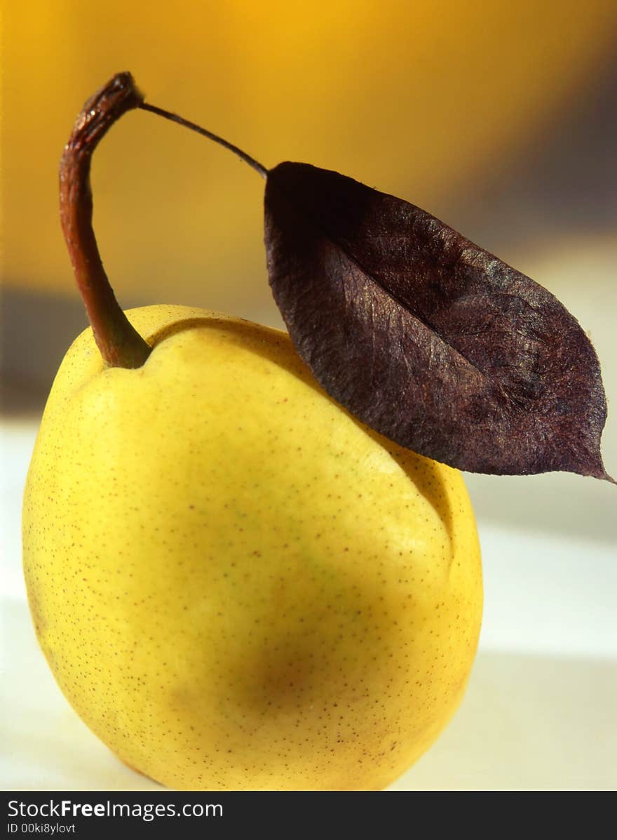 Pear on a yellow background