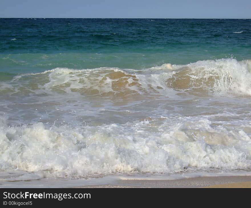 St Ives beach, baby surfing waves,. St Ives beach, baby surfing waves,