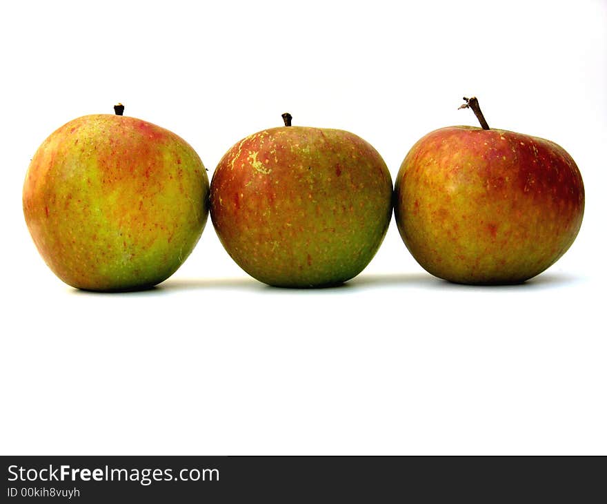 Three apples on a white background