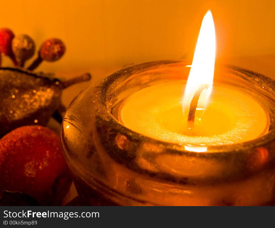 Close up of a candle with fall decorations. Close up of a candle with fall decorations