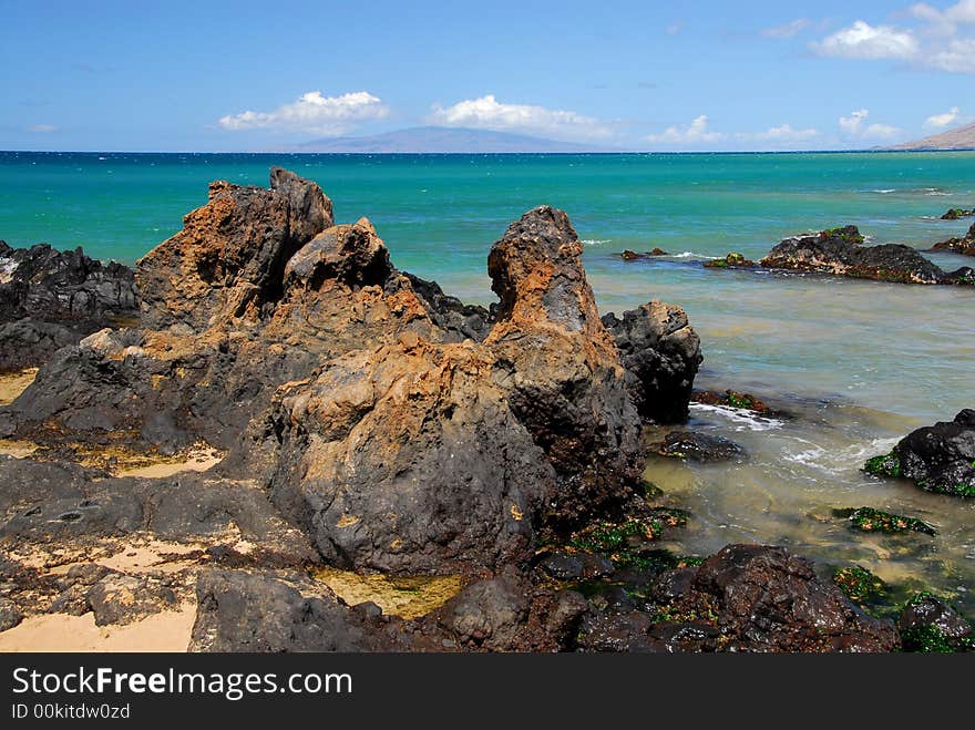 Rocky Shoreline By The Sea