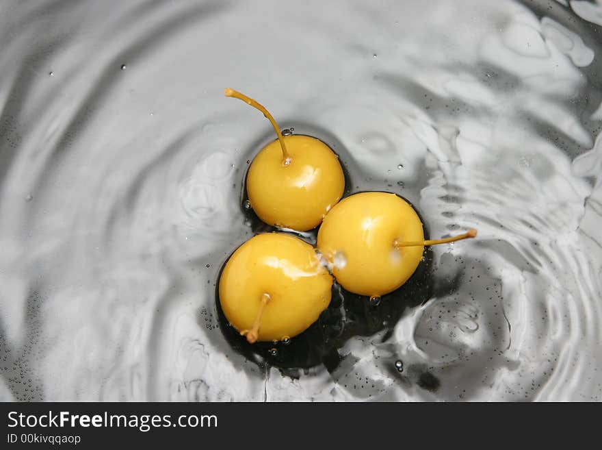 Image of three fresh fruits in water. Image of three fresh fruits in water