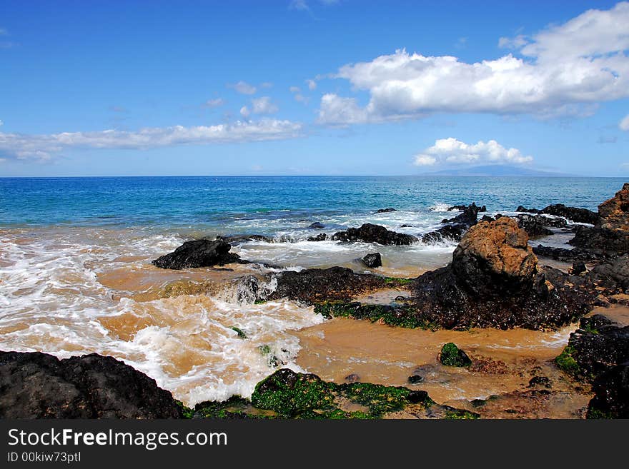 Rocky Shoreline By The Sea