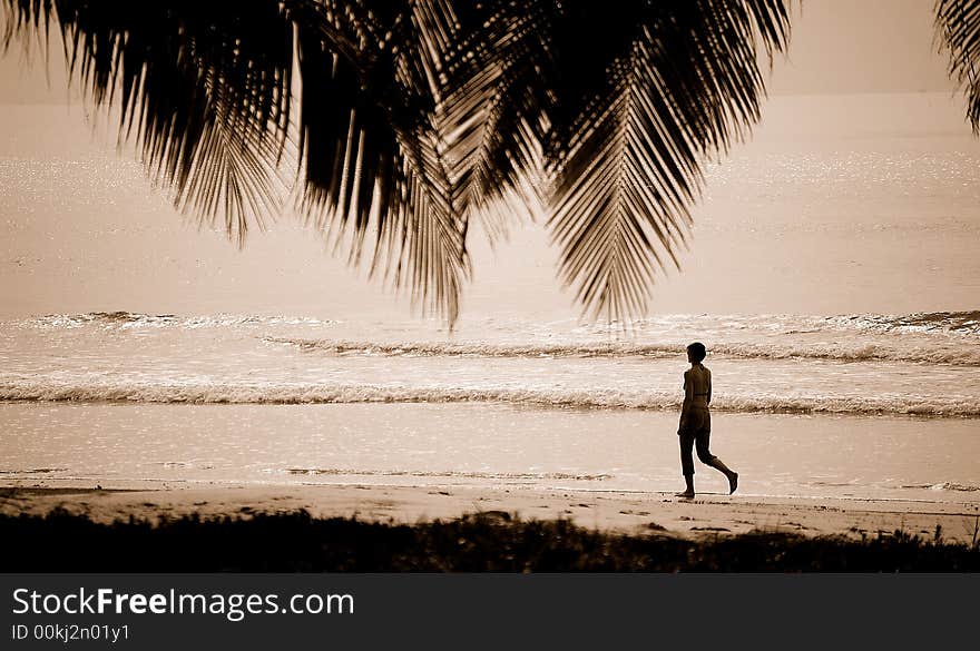 A woman walking at the beach, taken at sanya, China