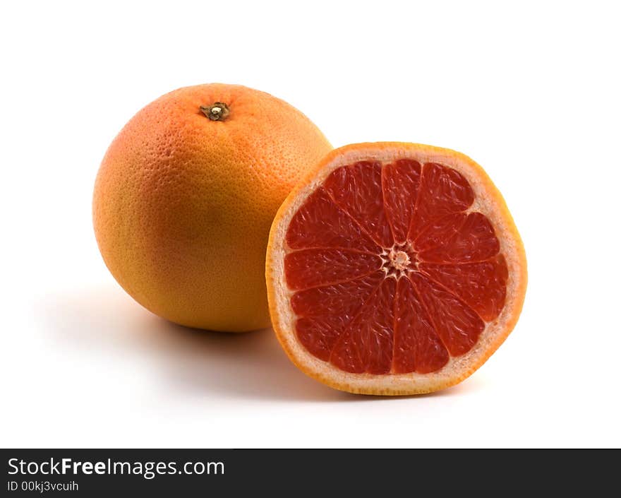 Red grapefruit on white background. Red grapefruit on white background