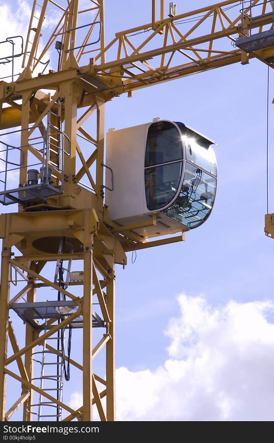 Crane cabin on sky background