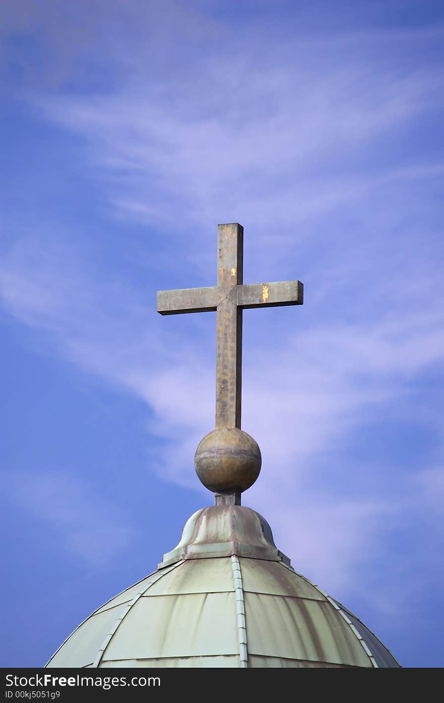 Cross on sky background religion