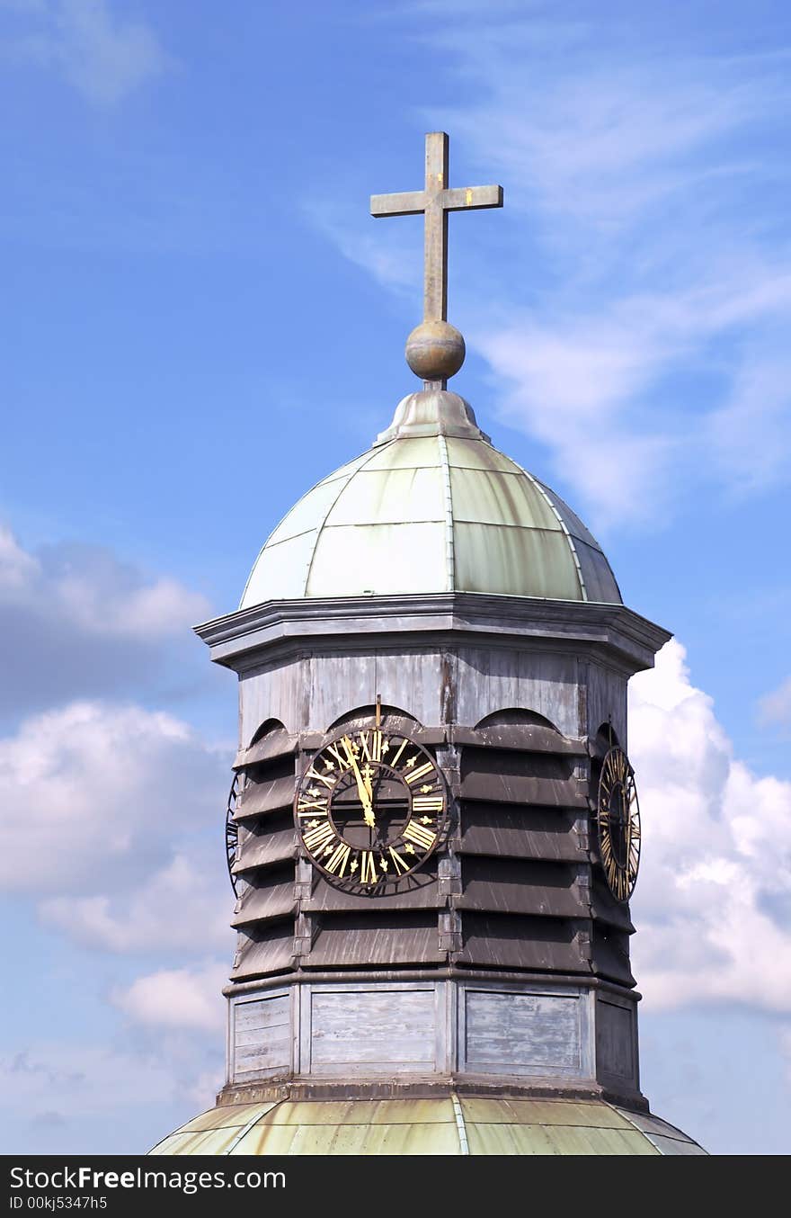 Cupola an cross on sky background