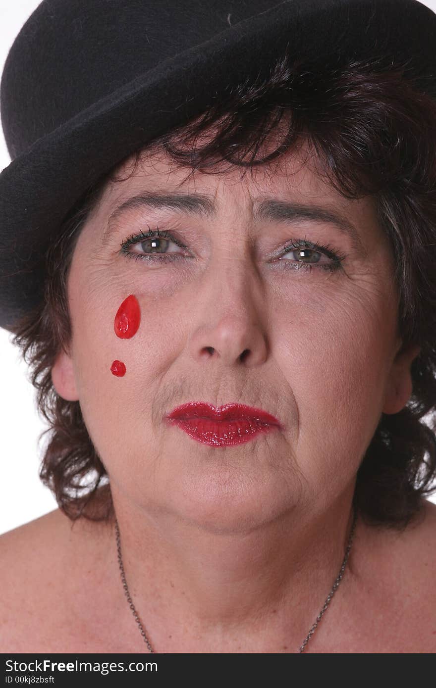 Portrait of an actress performing sad clown