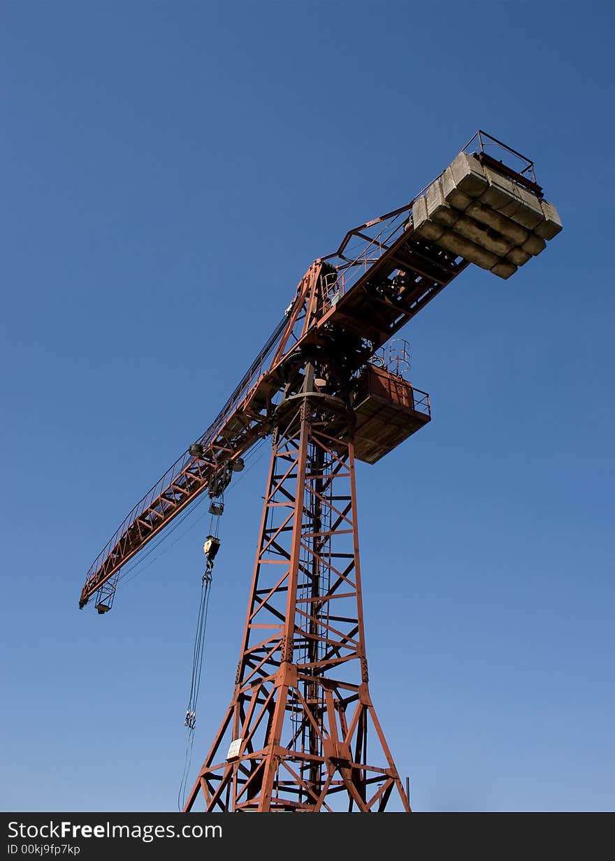 Red crane and blue sky.