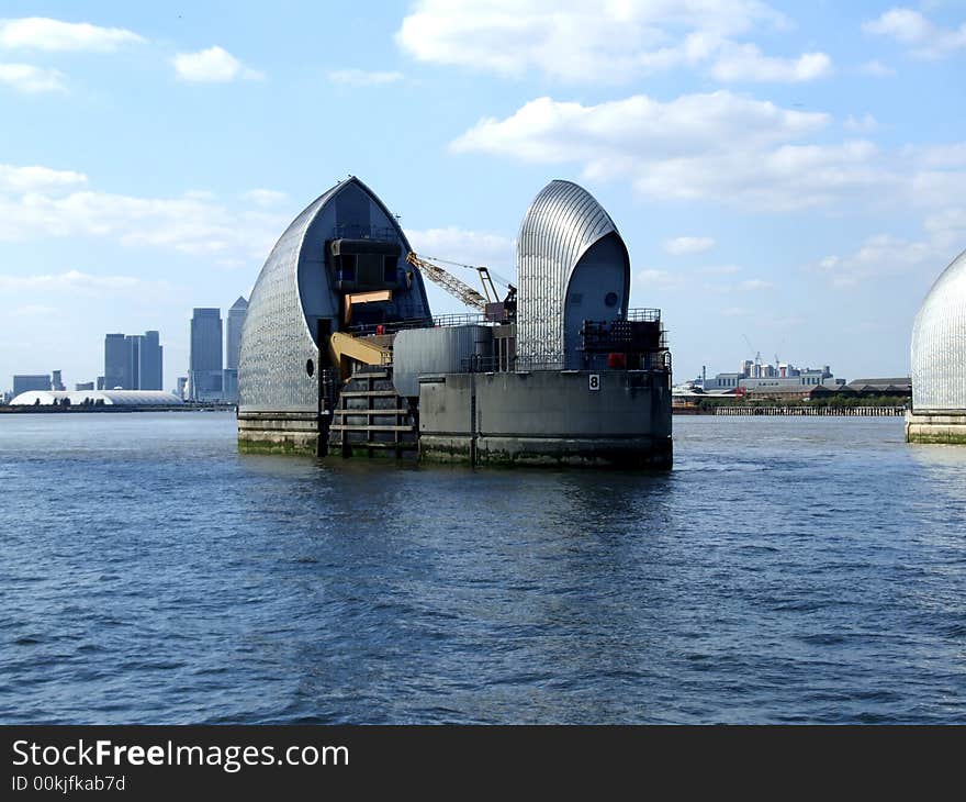 An image of the tidal protector the Thames Barrier that protects London from environmental flooding. An image of the tidal protector the Thames Barrier that protects London from environmental flooding.