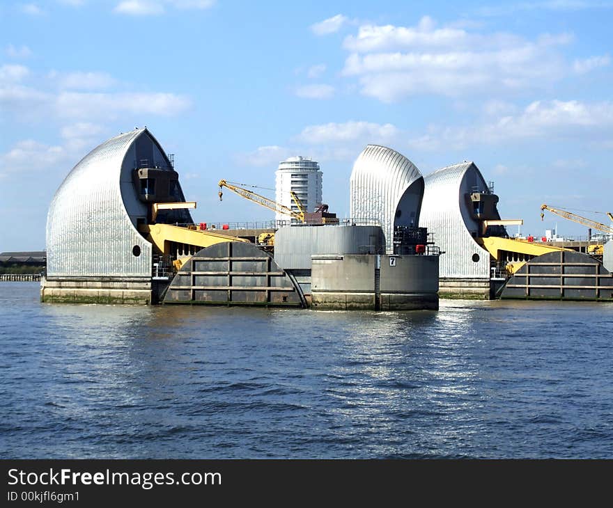 An image of the tidal protector the Thames Barrier that protects London from environmental flooding. An image of the tidal protector the Thames Barrier that protects London from environmental flooding.