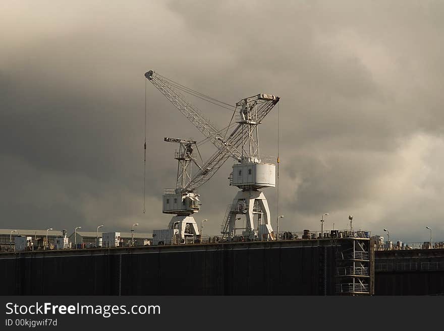 Two cranes on a repair ship