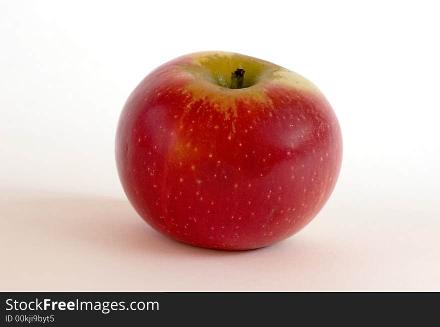 One red apple on isolated white