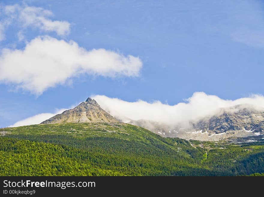 Mountains and clouds in Alaska. Mountains and clouds in Alaska