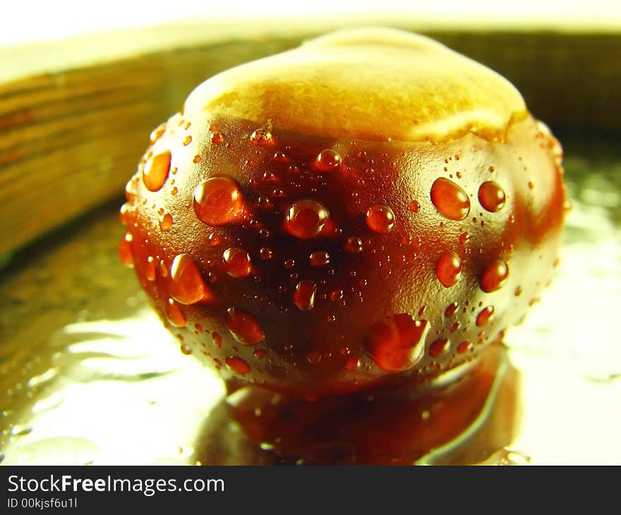 Wet chestnut on mirror