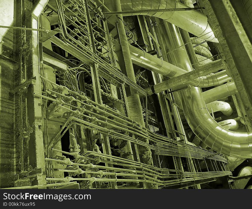 Different types of pipes and tanks inside energy plant. Different types of pipes and tanks inside energy plant