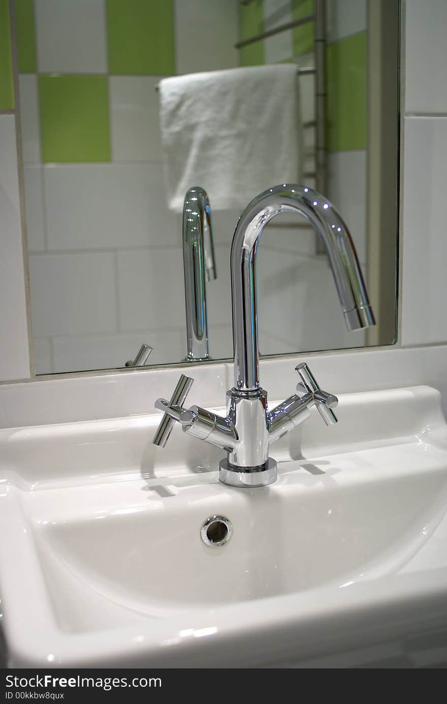 Green Tiles, Shiny Faucet.