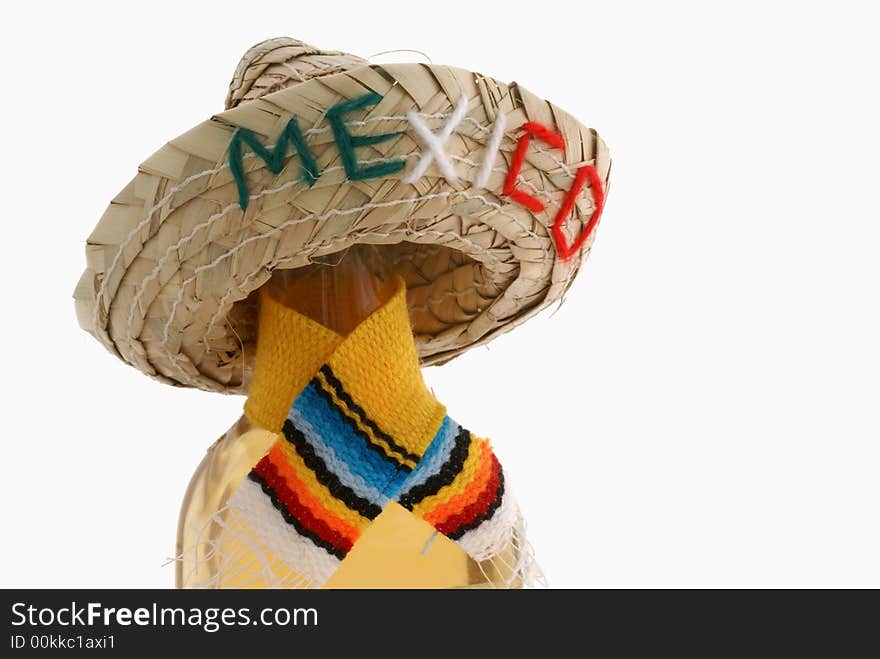 Isolated bottle with shawl and hat. Isolated bottle with shawl and hat.