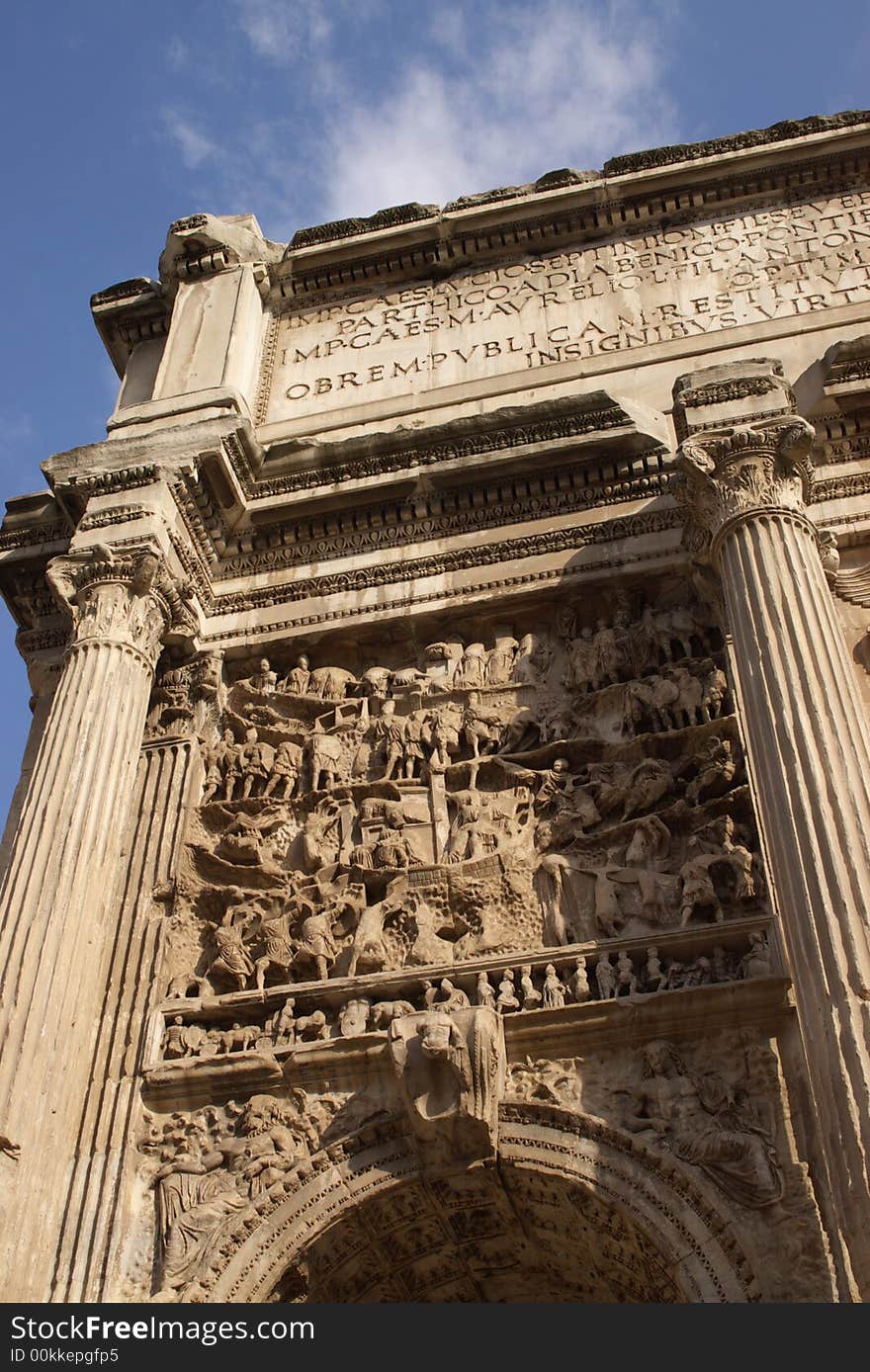 Fragment of arch in roman forum, vertical. Rome, Italy. Fragment of arch in roman forum, vertical. Rome, Italy.