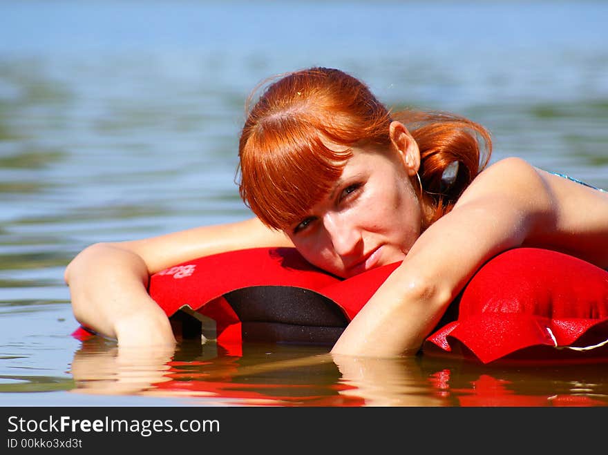 Girl on an inflatable mattress