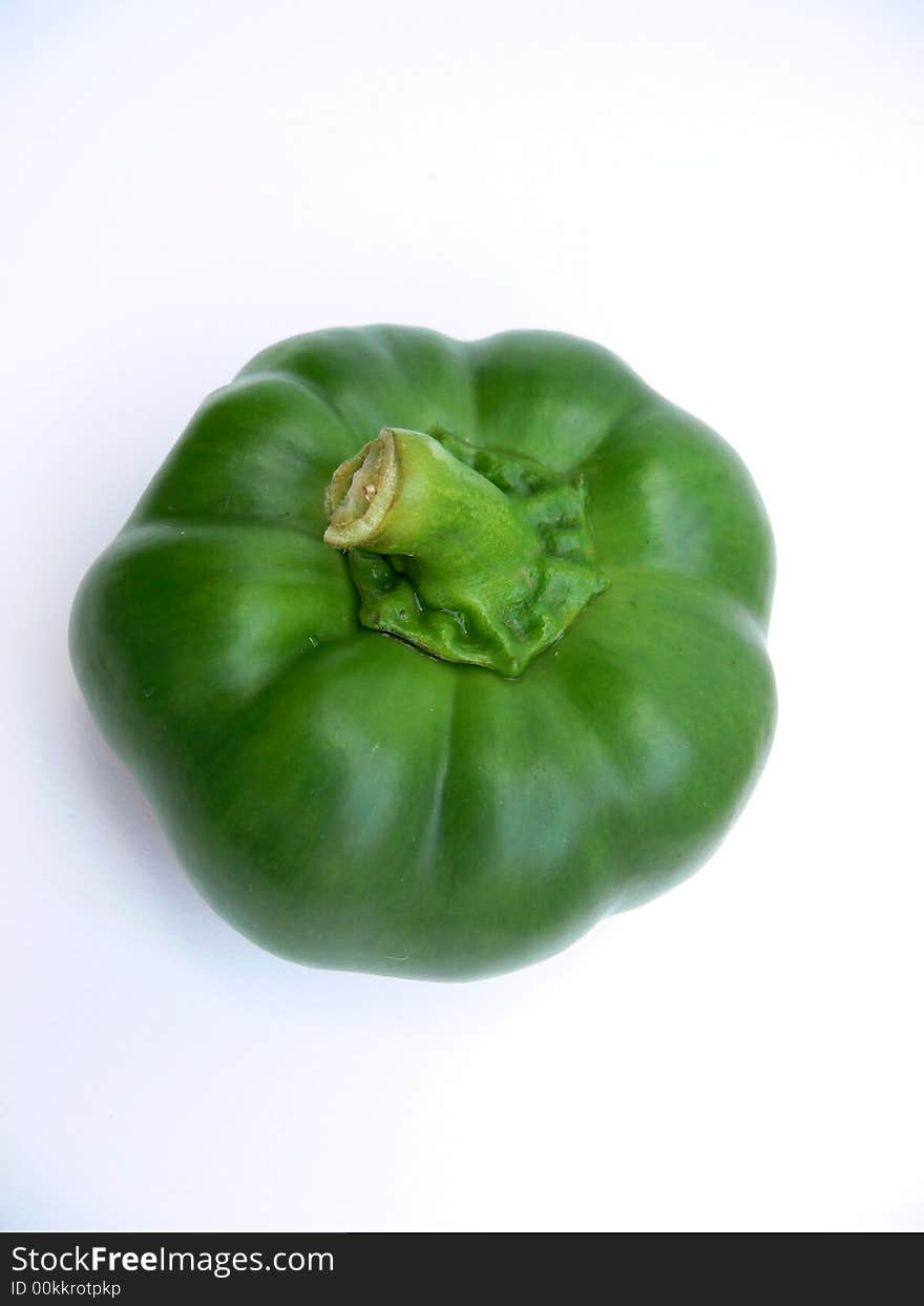 Green pepper on the white background