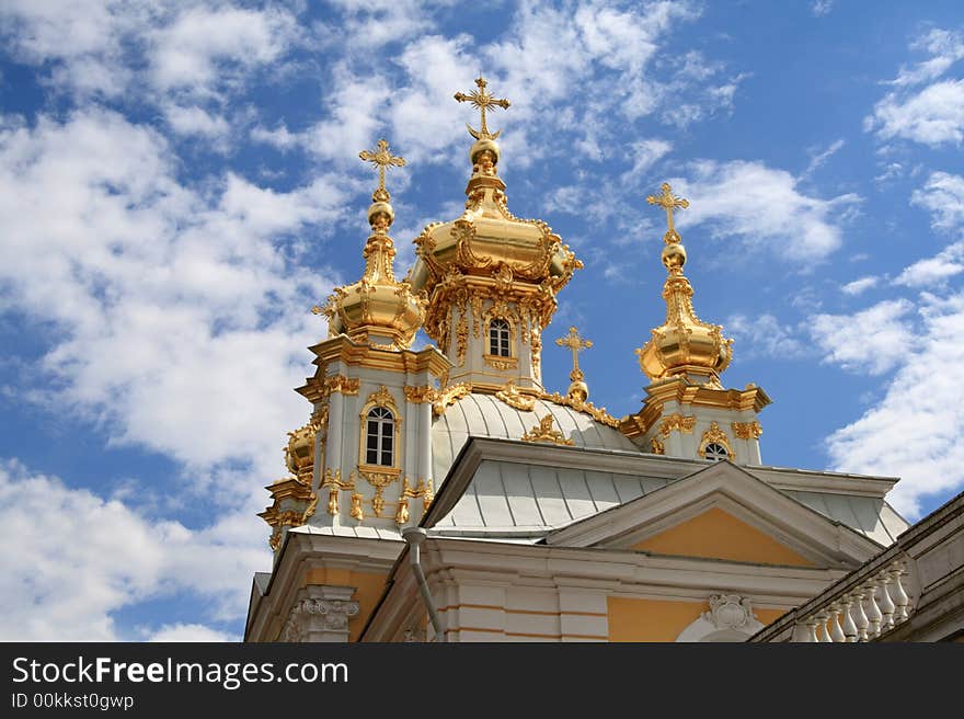 The golden orthodox church against the sky background. The golden orthodox church against the sky background