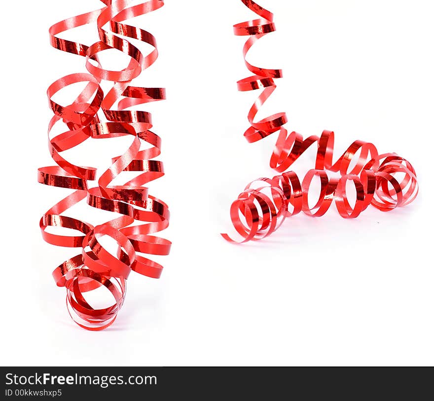 Set of red curly ribbons on white