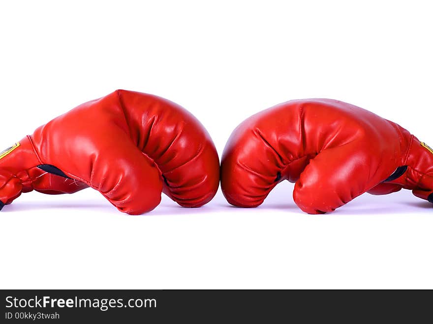 Red boxing gloves on white