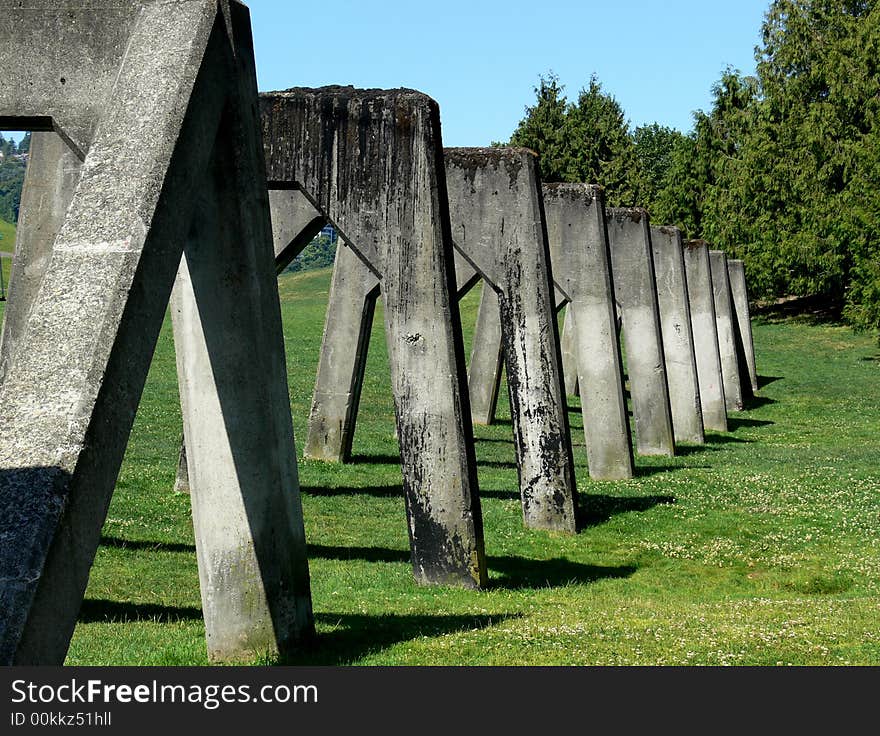 Shot of a row of old cocrete supports. Shot of a row of old cocrete supports.