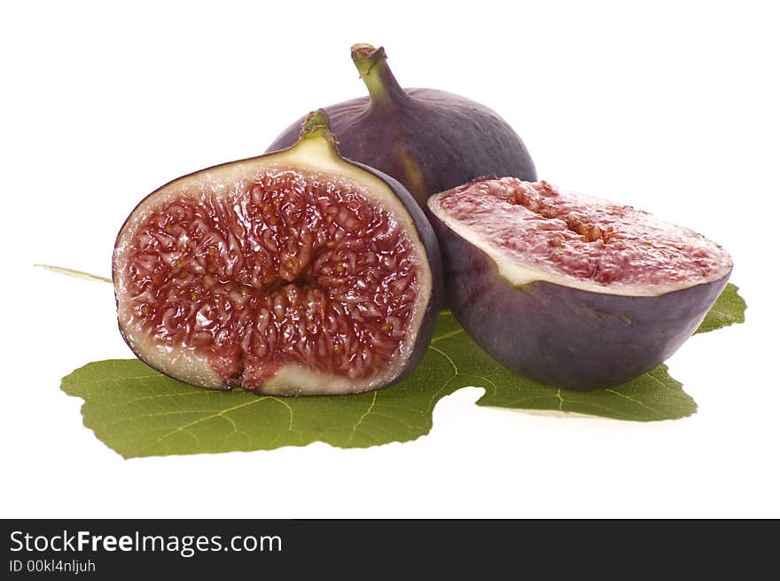 Fresh figs. fruits and leaf isolated on the white background