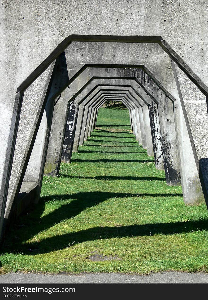 Shot trough a row of concrete supports. Shot trough a row of concrete supports.