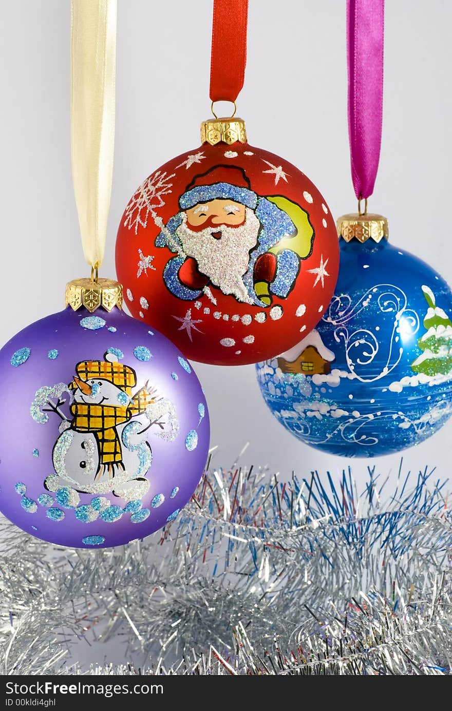 Three big hanging color christmas tree balls. Three big hanging color christmas tree balls