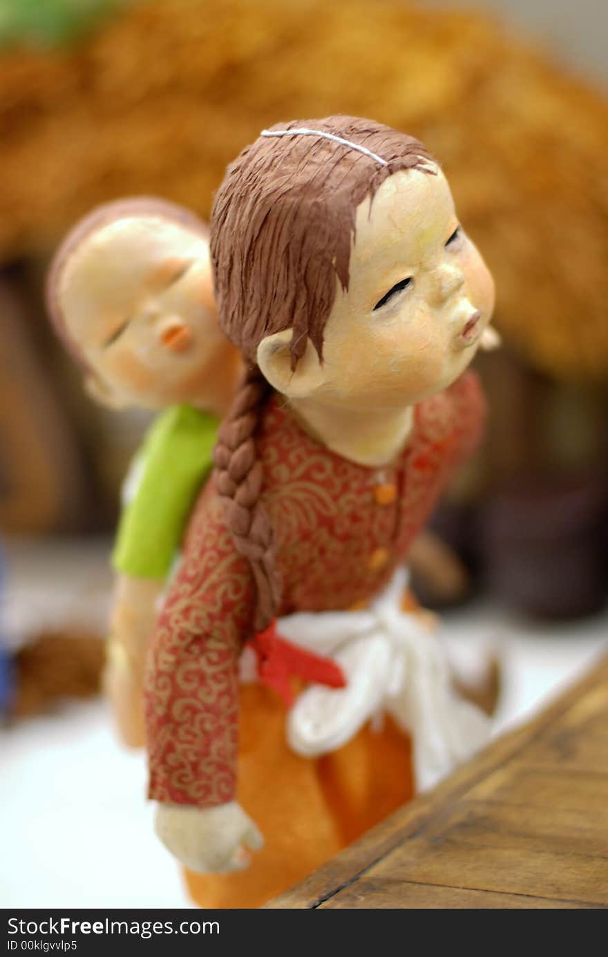 Korean Folk Art, miniature Clay dolls dressed in traditional costume. Korean Folk Art, miniature Clay dolls dressed in traditional costume